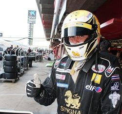 Sandy gives the thumbs up in the pit lane.